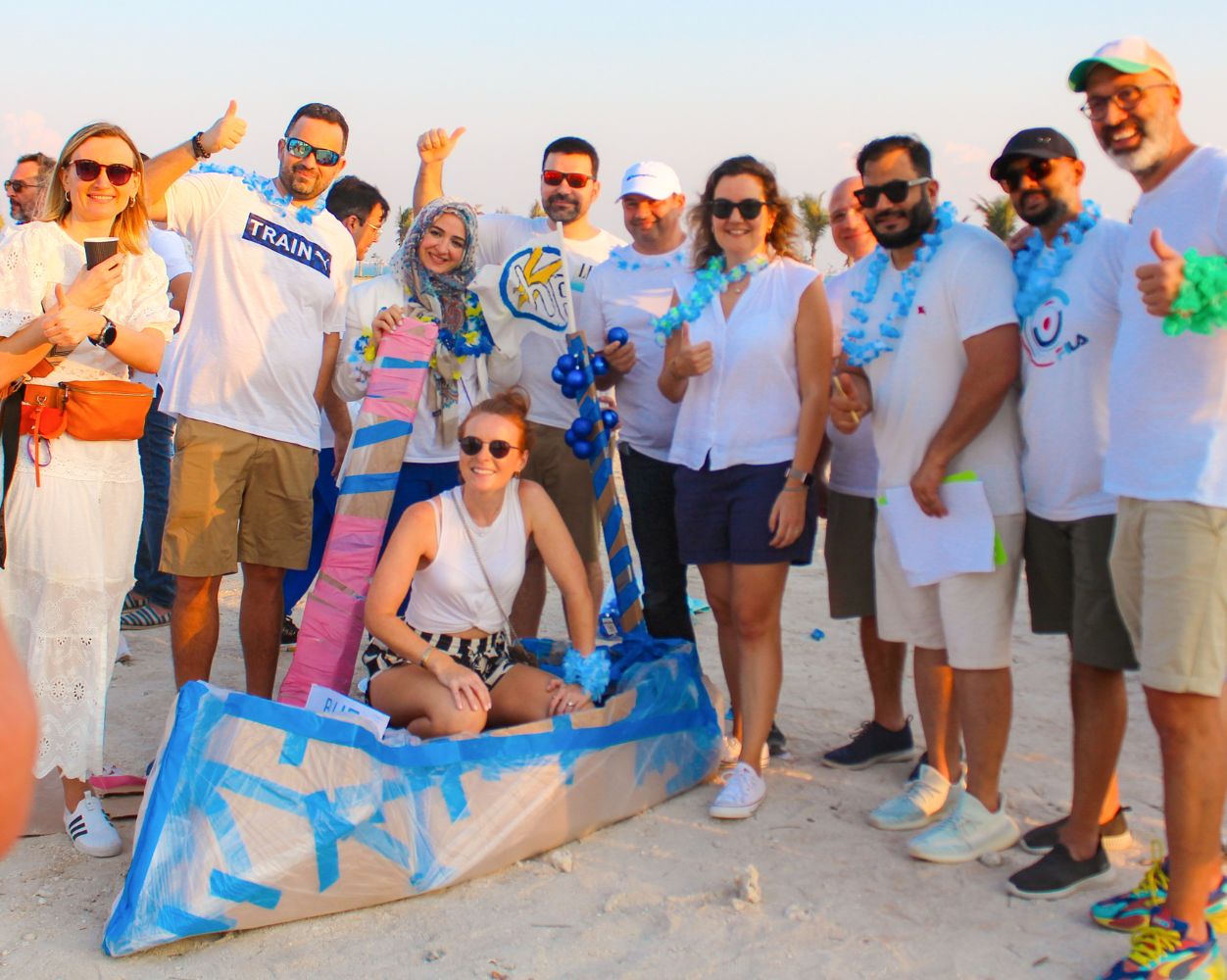 Participants solving challenges during HP outdoor team building programme by Ignite Training.